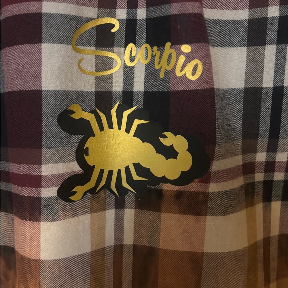 Bleached upcycled flannel with Scorpio transfer on back